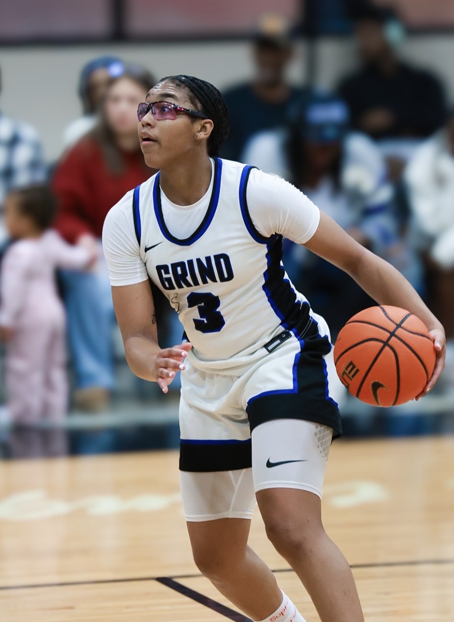 Grind Prep number 3 bringing the ball up the court